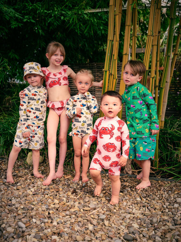 Group of kids wearing swimwear in different IBIZA and animal print